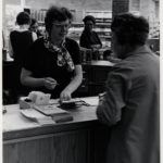 Library director Barbara Rau pitches in at the checkout desk, 1974 (Bethlehem Public Library archives)